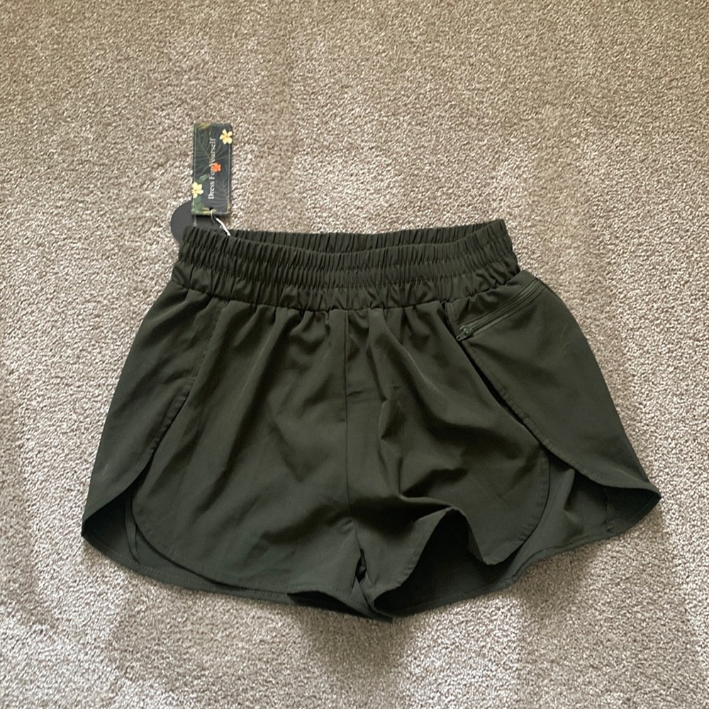 Green running shorts. Brand new. Never worn.